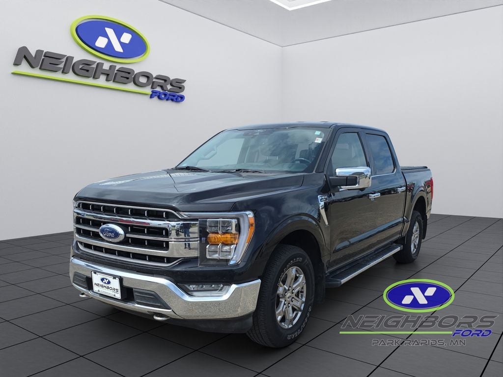 2021 Ford F-150 Lariat in Black Metallic — front three-quarter view