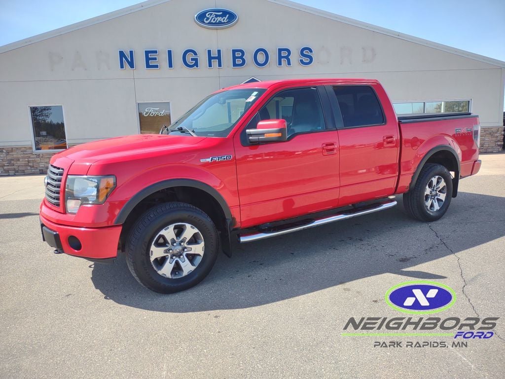 2011 Ford F-150 FX4 in Race Red — front three-quarter view