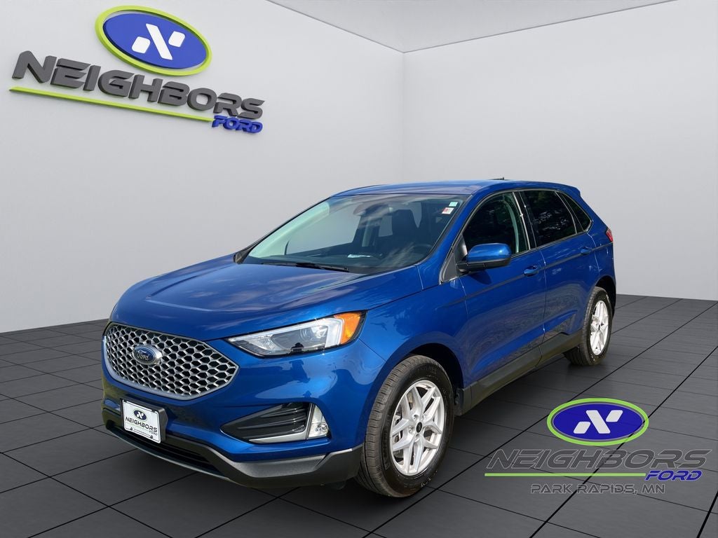 2024 Ford Edge SEL in Blue Metallic — front three-quarter view