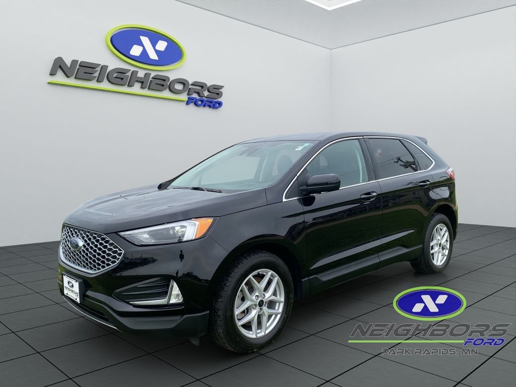 2024 Ford Edge SEL in Black Metallic — front three-quarter view